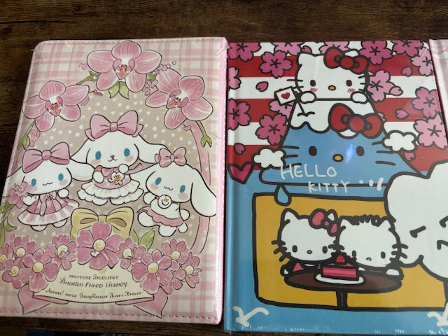 Two colorful books with Cinna and HK 