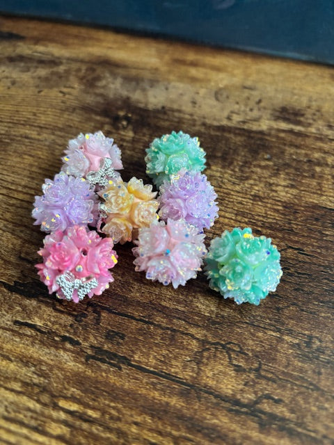 Flower beads with glitter and silver bows