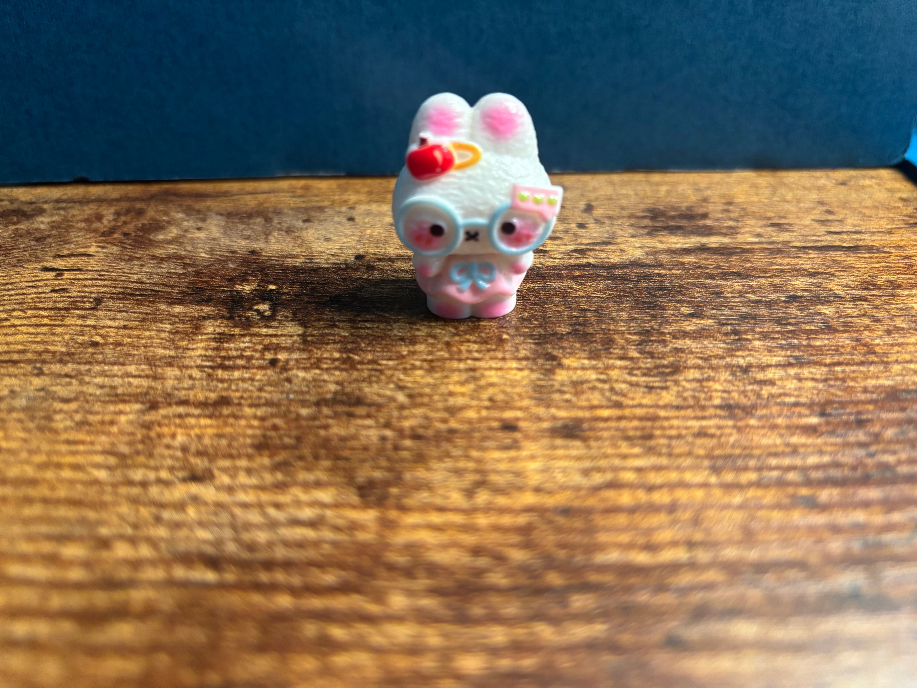 Assorted DIY figurines by Whimsy Nature featuring colorful, handcrafted designs on display.