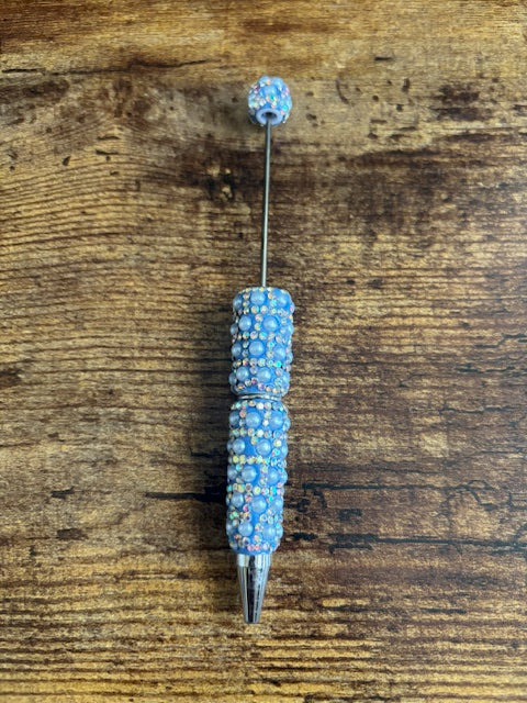 Lux Fancy Beadable Pens by Whimsy Nature DIY featuring colorful beads and sleek pen design on a white background.